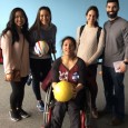 PT student Tara Dorenkamp and 2014 graduates Allie (Bruns) Katsiris and Nick Katsiris served children at an Adaptive Sports Play...